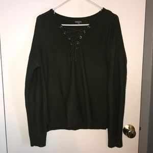 dark green sweater